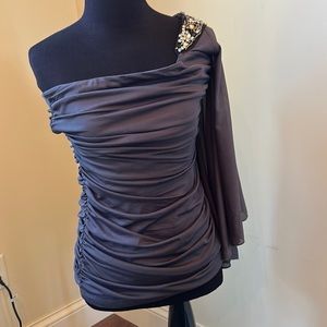 Sexy off the shoulder one sleeve blouse 
Size medium